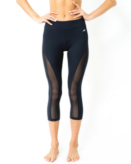L'ESPACE LOW-WAISTED CAPRI LEGGINGS WITH MESH PANELS AND REFLECTIVE STRIPS